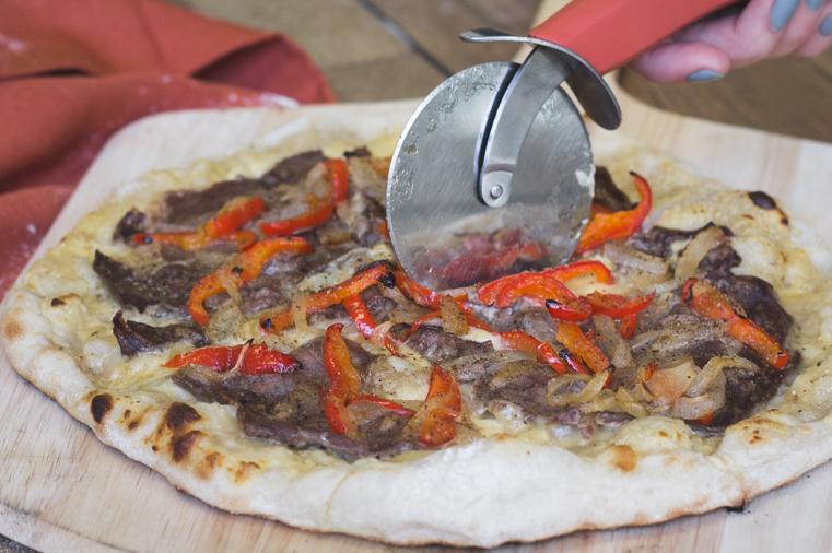 A Special Super Bowl Pizza Showdown: Philly Cheesesteak Vs. Clam Chowder Pizza